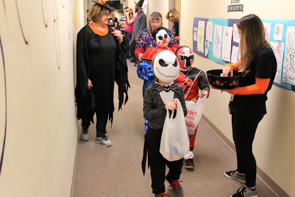 A group of special education students get ready for a Halloween parade