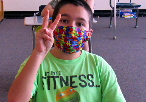 Students adjust to wearing a mask during their school day.