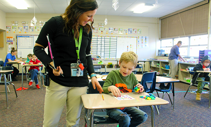 teacher-helping-emotional-support-student-2