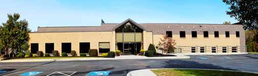 The front of a tan brick special education school in New Cumberland