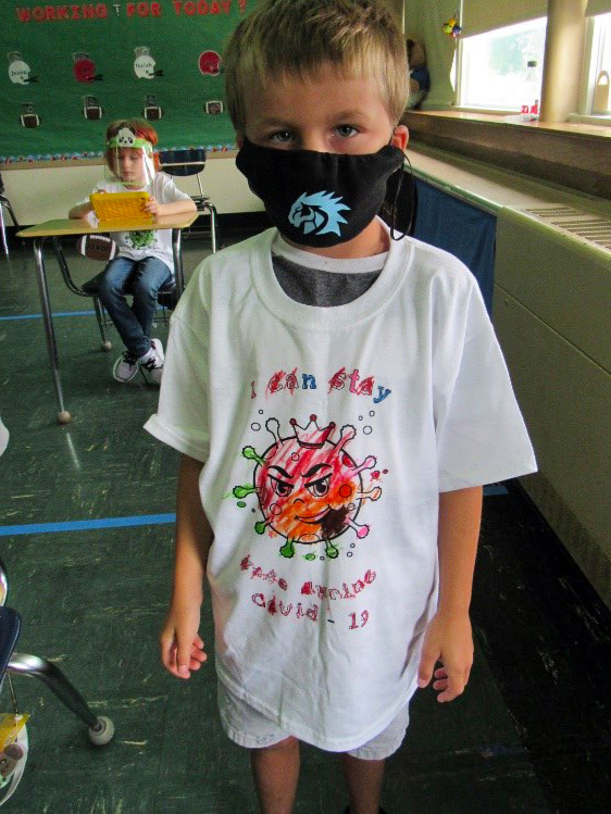 Students adjust to wearing a mask during their school day.