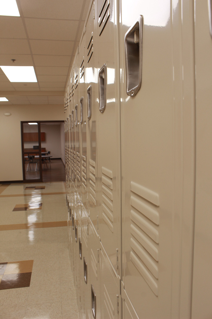 Locker detail, in the distance the entrance to the cafeteria.