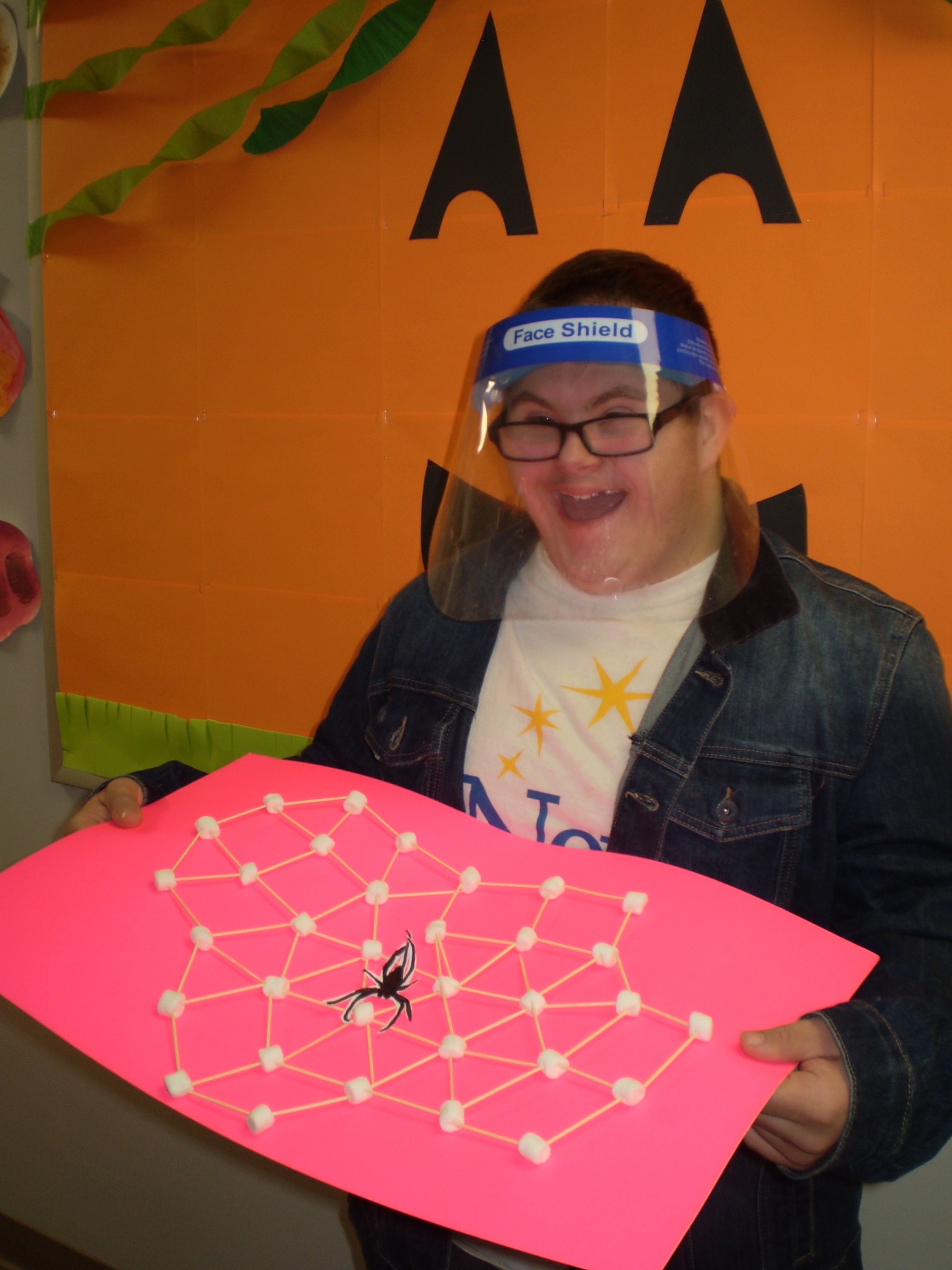 Students at New Story Schools Wyoming created spider webs and spiders for Halloween.